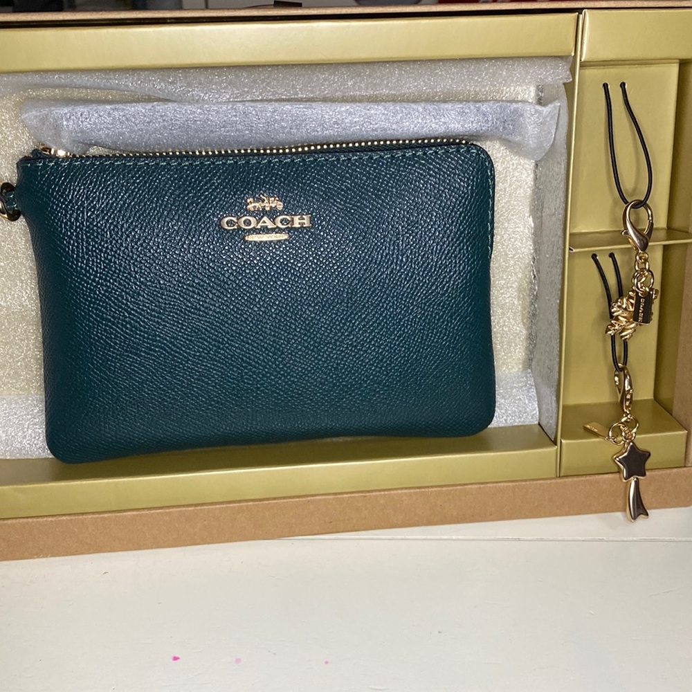 COACH LEATHER WRISTLET WITH TWO REMOVABLE CHARMS